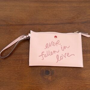 Kate Spade Blush Pink Wristlet with Playful Script